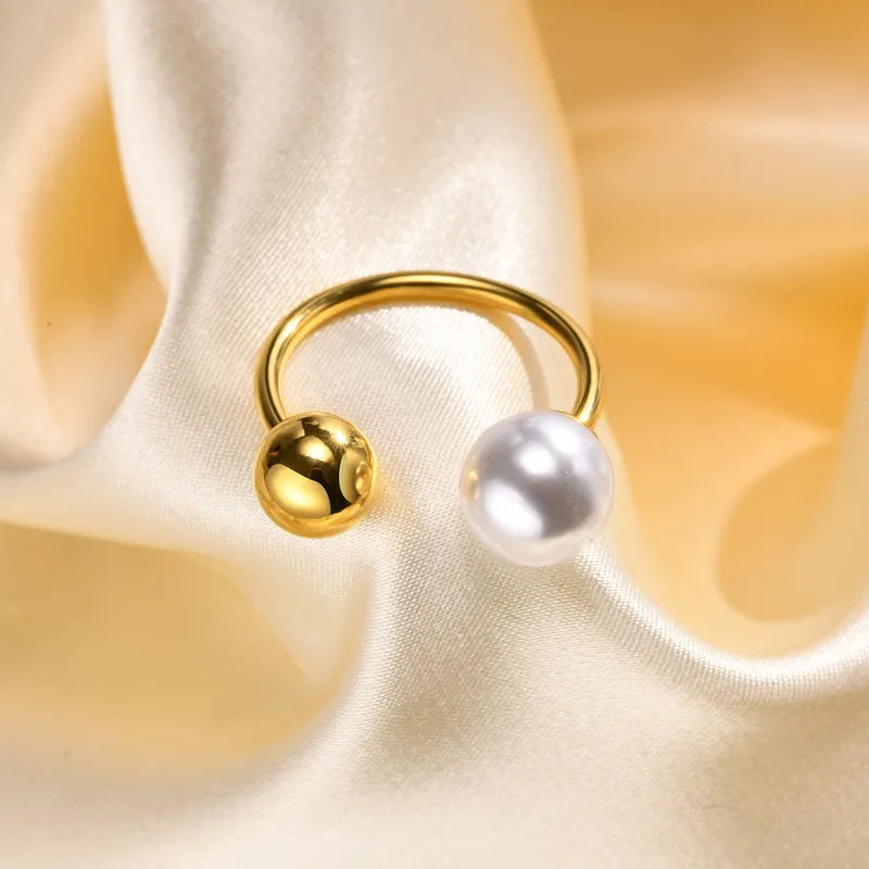 Gold and pearl open ring