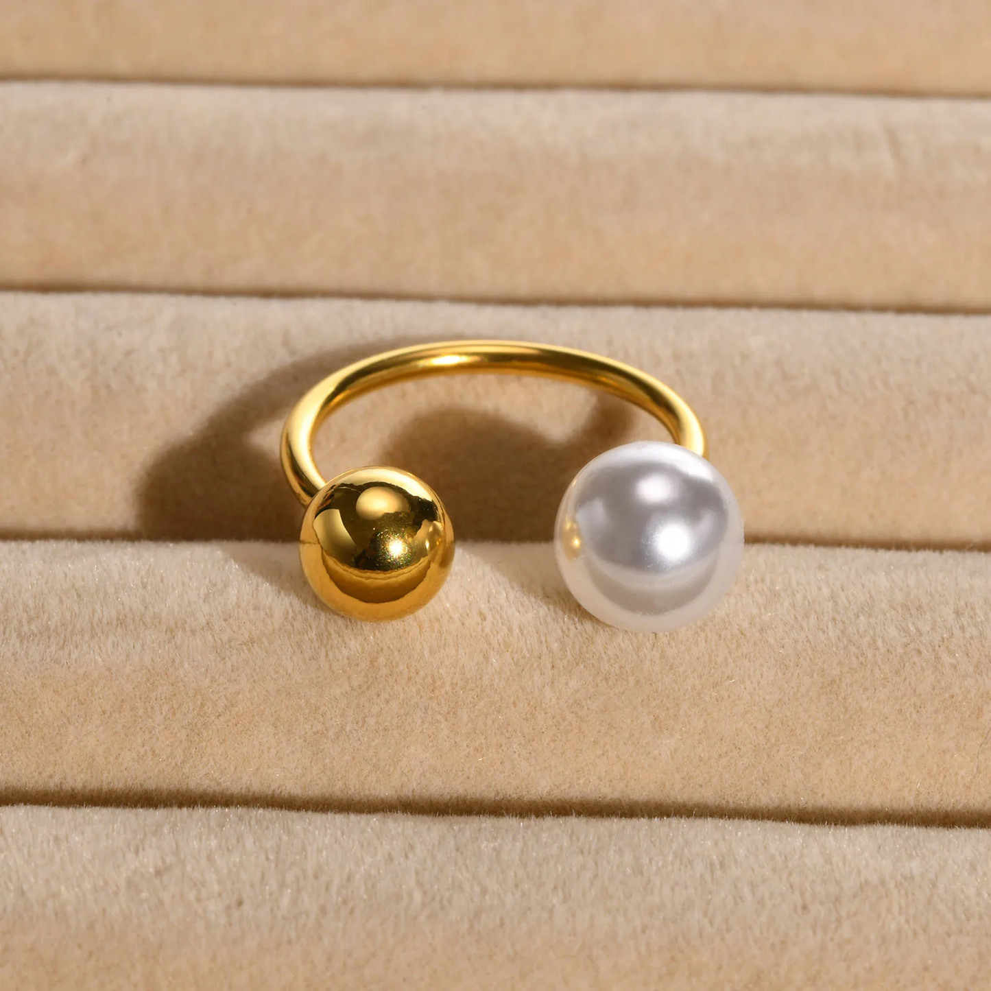 Gold and pearl open ring